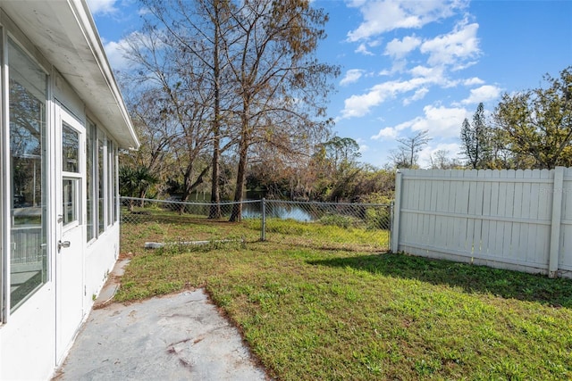 view of yard with a water view