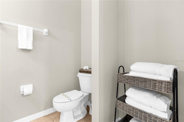 bathroom featuring tile patterned floors and toilet