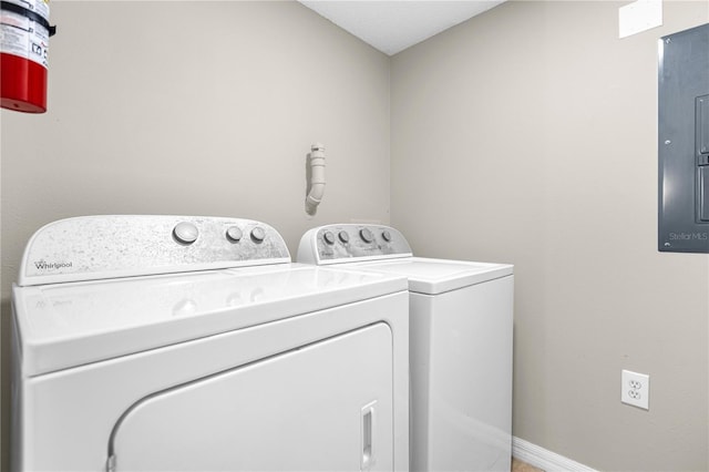 washroom featuring washer and dryer and electric panel