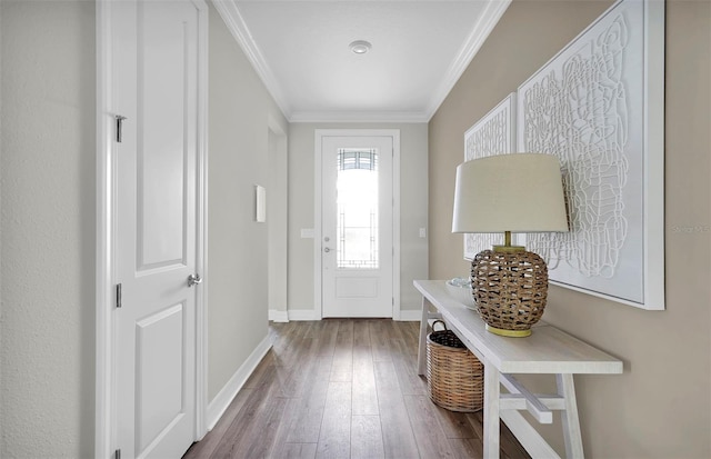 entryway featuring hardwood / wood-style flooring and crown molding