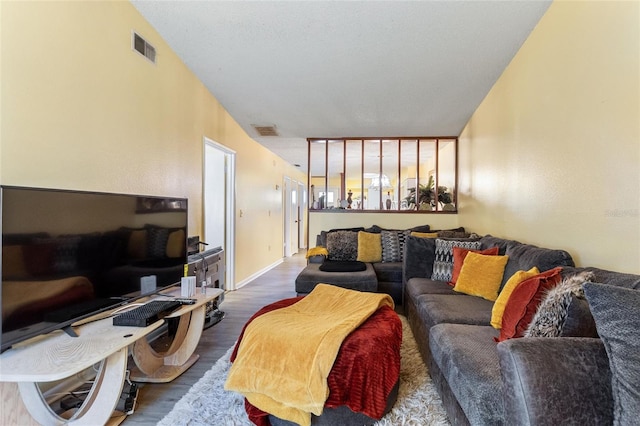 living room with dark wood-type flooring