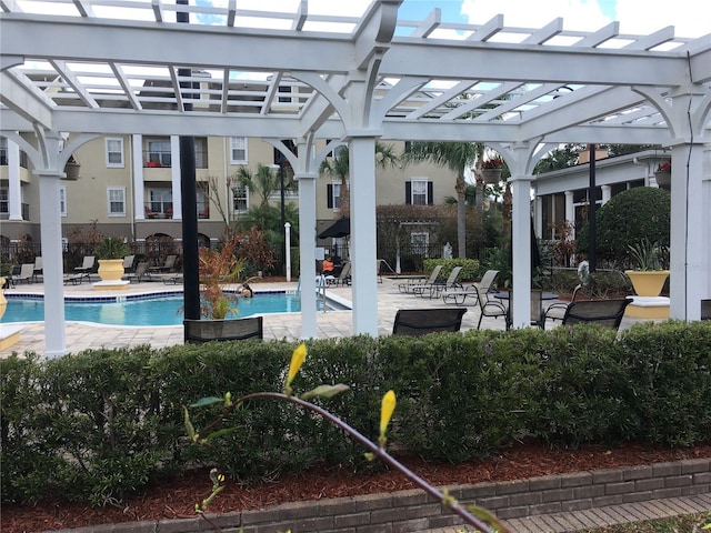 view of pool with a pergola