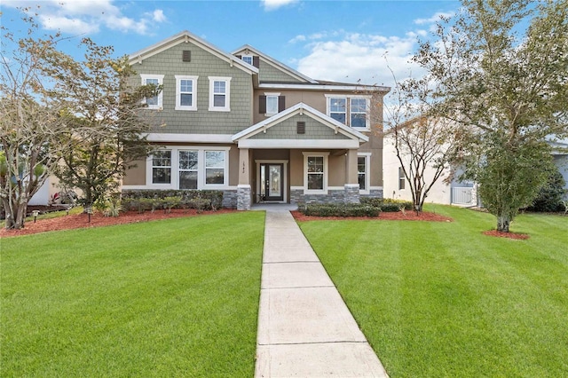 craftsman-style house with a front yard