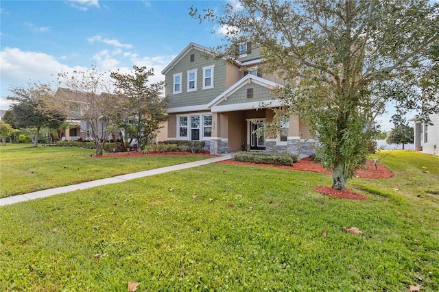 craftsman house featuring a front yard