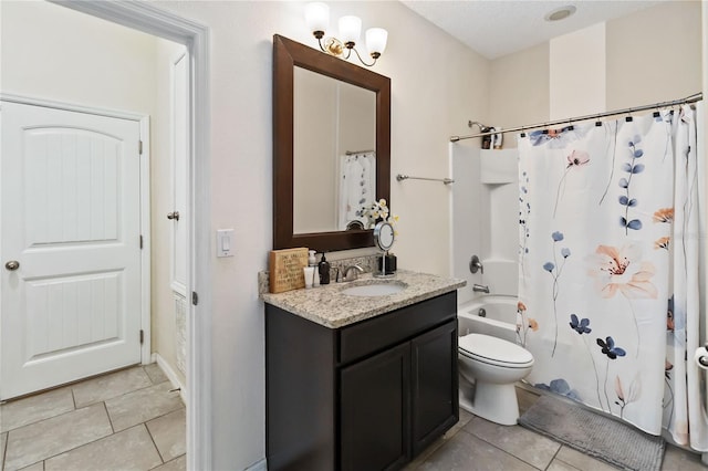 full bathroom with vanity, toilet, and shower / tub combo