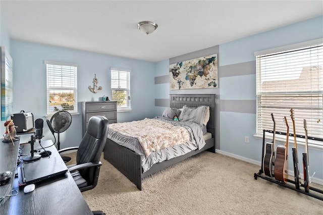 bedroom featuring light carpet