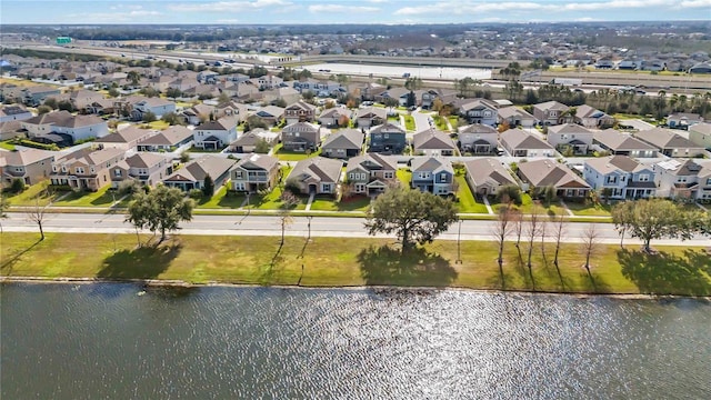 drone / aerial view with a water view