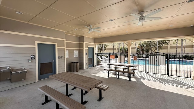 view of patio / terrace featuring a community pool