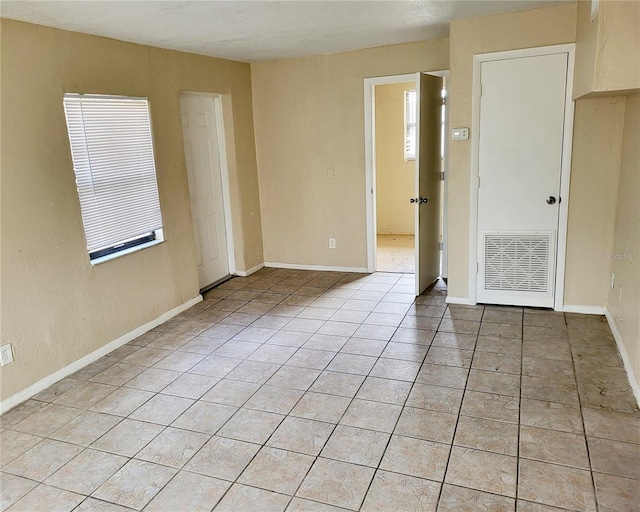 view of tiled empty room