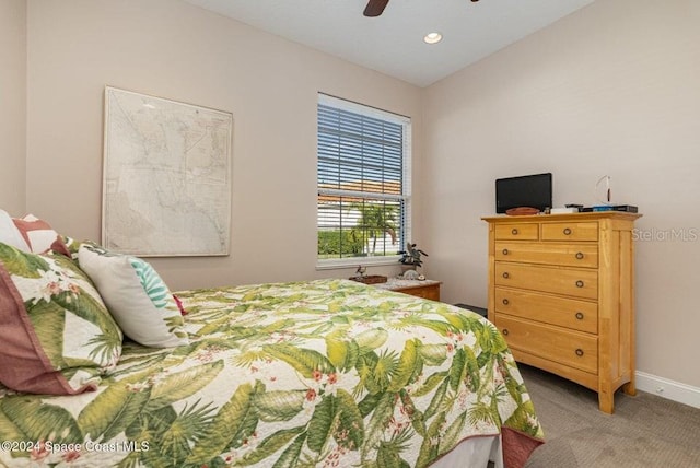 bedroom featuring ceiling fan and carpet floors