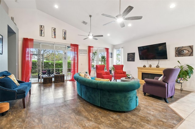 living room with ceiling fan and high vaulted ceiling