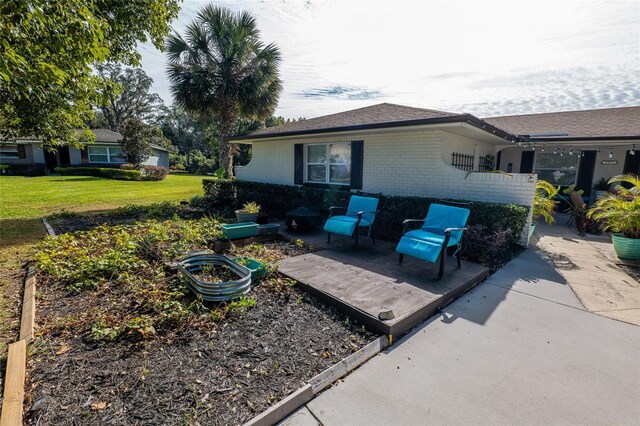 view of patio with a wooden deck