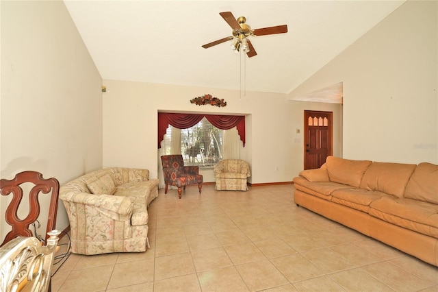 tiled living room featuring ceiling fan and vaulted ceiling