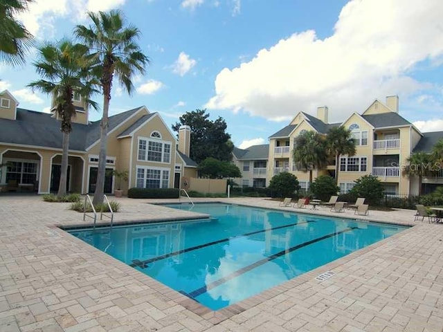 view of pool featuring a patio