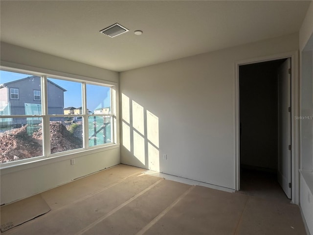 empty room featuring plenty of natural light