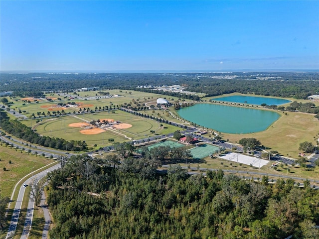 aerial view with a rural view and a water view