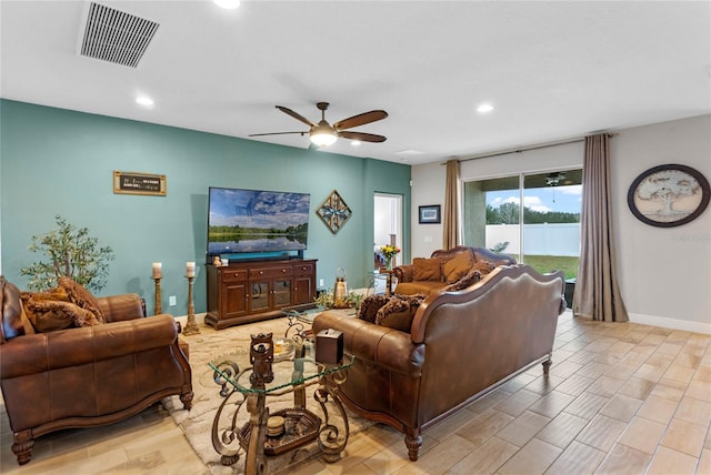 living room with ceiling fan