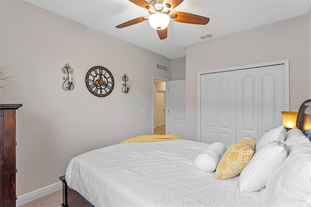 bedroom featuring ceiling fan, carpet floors, and a closet