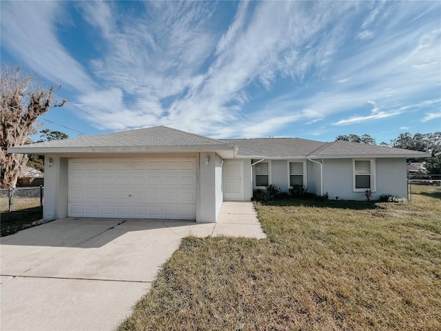 single story home with a garage and a front yard