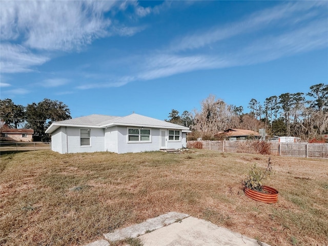 exterior space with a lawn