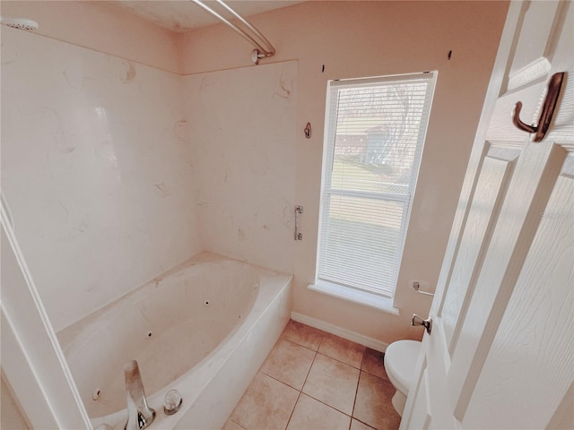 bathroom featuring tile patterned floors, shower / tub combination, and toilet