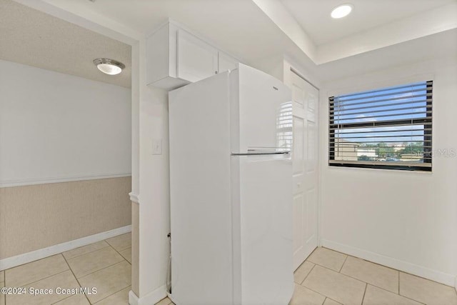 bathroom with tile patterned flooring