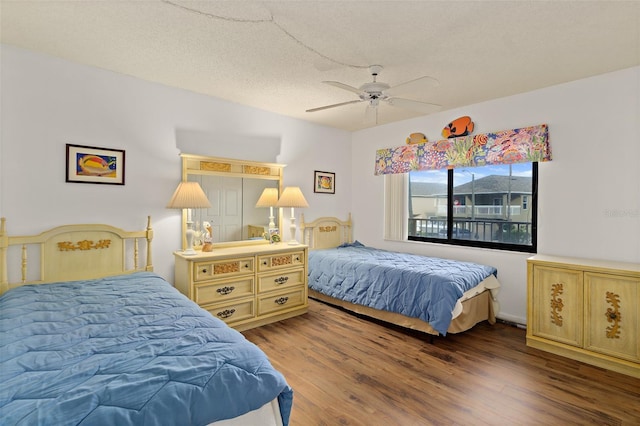 7520 Ridgewood Ave Unit 205, Cape Canaveral, FL 32920 - bedroom featuring ceiling fan and wood finished floors