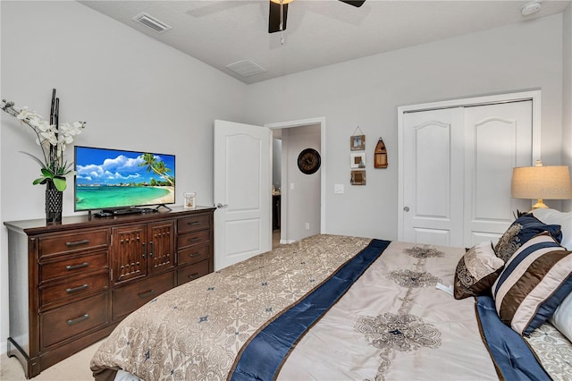 bedroom featuring ceiling fan and a closet