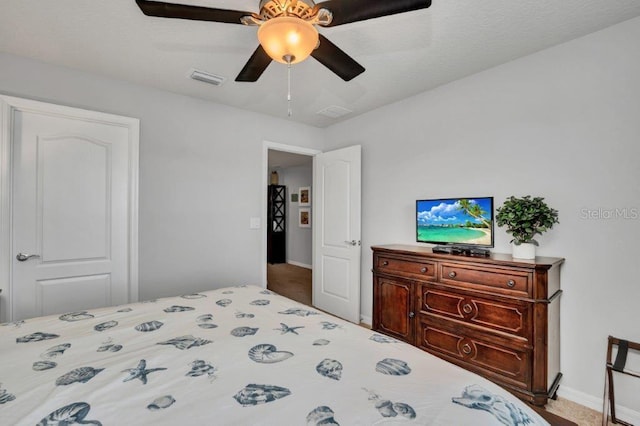 bedroom featuring ceiling fan