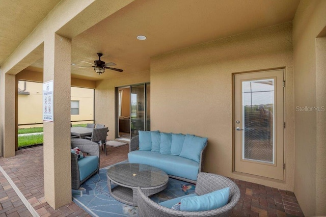 view of patio with ceiling fan and an outdoor hangout area