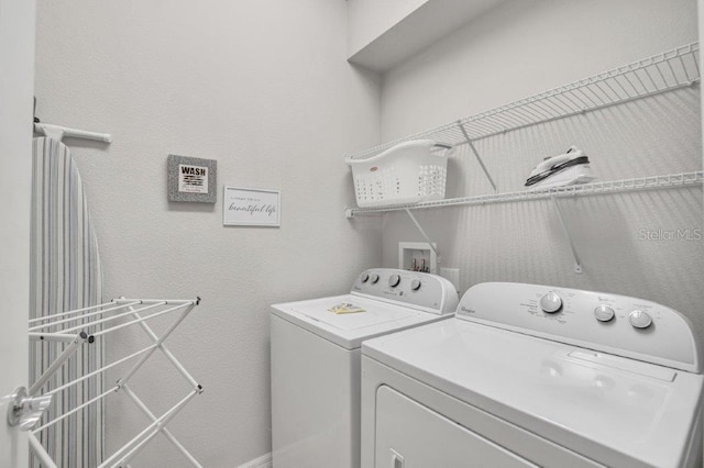 washroom featuring separate washer and dryer