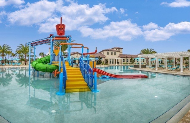 view of swimming pool featuring a pergola