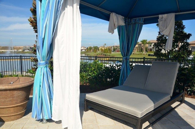 view of patio / terrace with a water view