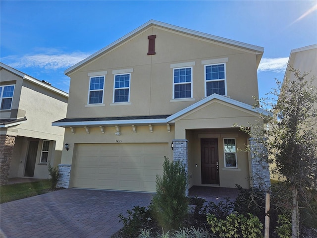 view of front of home with a garage