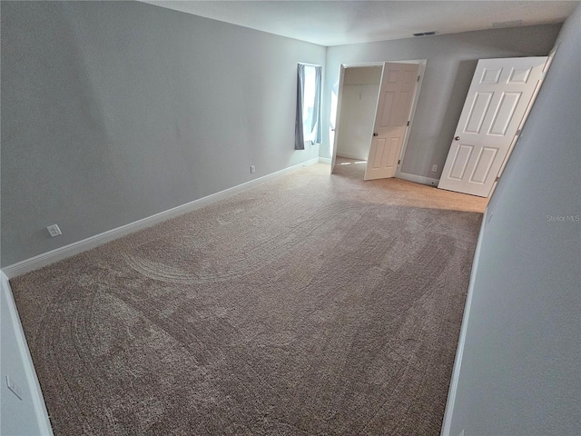 empty room with carpet floors