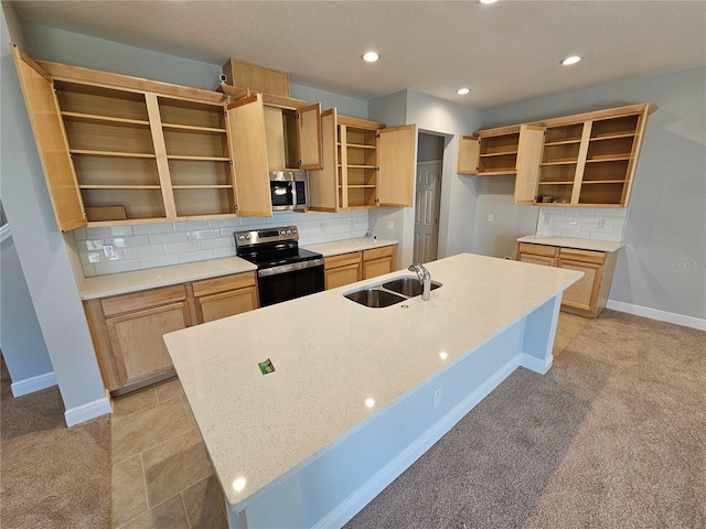 kitchen featuring stainless steel appliances, sink, light colored carpet, and light brown cabinetry