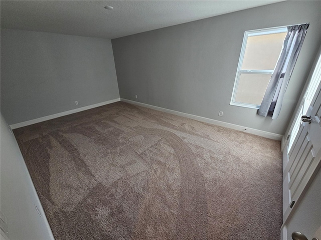 empty room with carpet floors