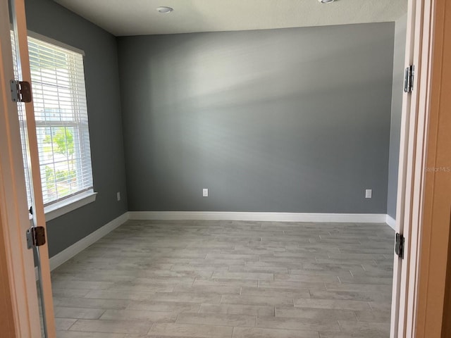 4535 Gliding Wave St, Winter Garden, FL 34787 - spare room with light hardwood / wood-style floors