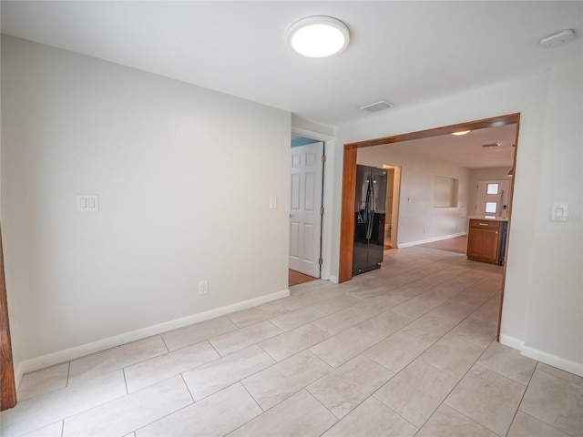 view of tiled spare room