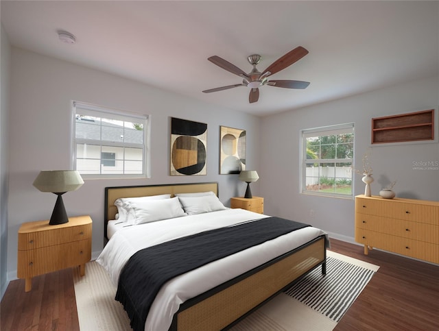 bedroom featuring multiple windows, ceiling fan, and dark hardwood / wood-style flooring