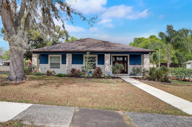 view of front of home with a front lawn