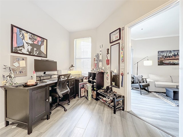 office with light hardwood / wood-style flooring