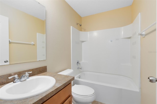 full bathroom featuring vanity, toilet, and tub / shower combination