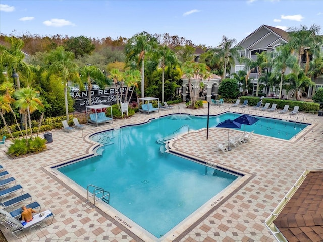 view of swimming pool with a patio area