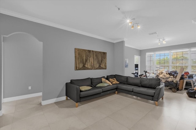 tiled living room featuring crown molding