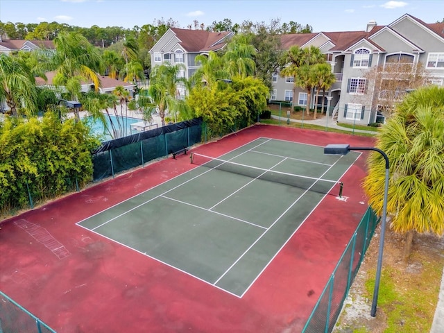 view of tennis court with basketball court