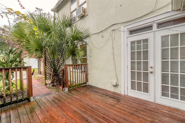 deck featuring cooling unit and french doors