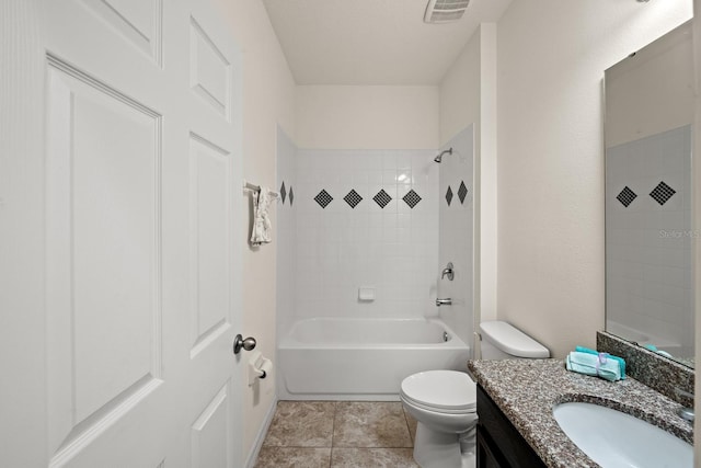 full bathroom with vanity, toilet, and tiled shower / bath