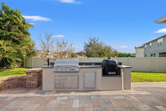 view of patio featuring a grill and area for grilling