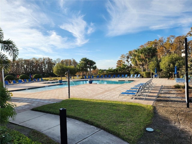 view of swimming pool featuring a patio